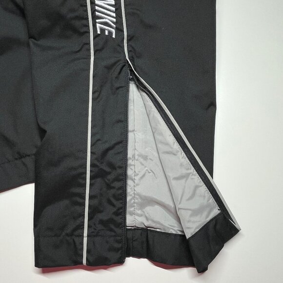 Nike Windrunner Women's High-Waisted Zipper Open-Hem Pants - Picture 10 of 13